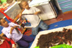 kids painting wool hanging
